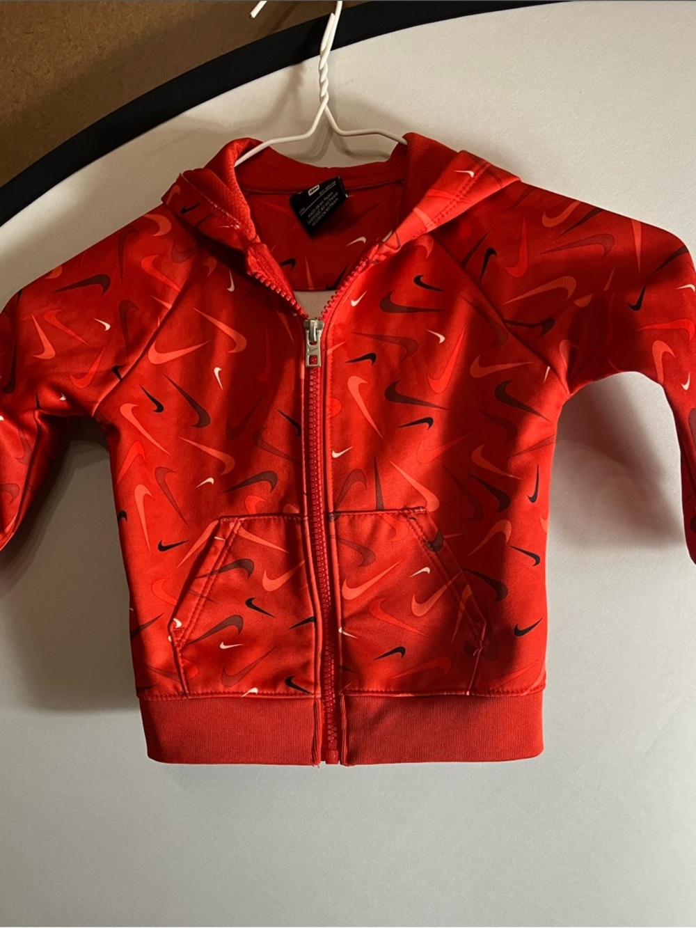 Nike Toddler Red Zip-Up Hoodie with Allover Swoosh